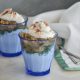 Two servings of banana parfaits, including coconut yogurt, cooked bananas, and mint for a holiday recipe.
