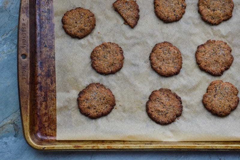 An overhead shot of gluten-free breakfast cookies on parchment paper.