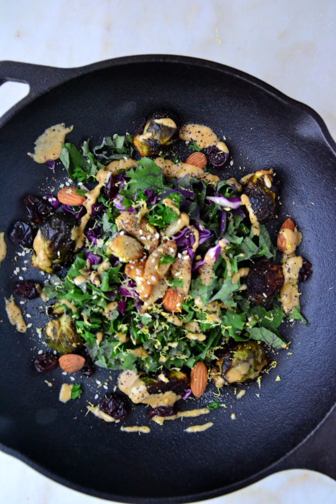 This Roasted Brussels Sprouts with Balsamic Glaze is easy to make for dinner and is loaded with detoxifying veggies and a balsamic dressing in a beautiful cast iron skillet.