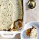 Cauliflower + Butternut Squash Bake with Caramelized Onions in a White Baking Dish