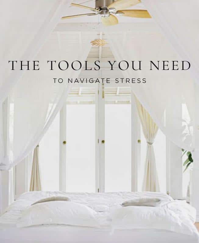 Beautiful white bedroom and the tools you need to navigate stress.