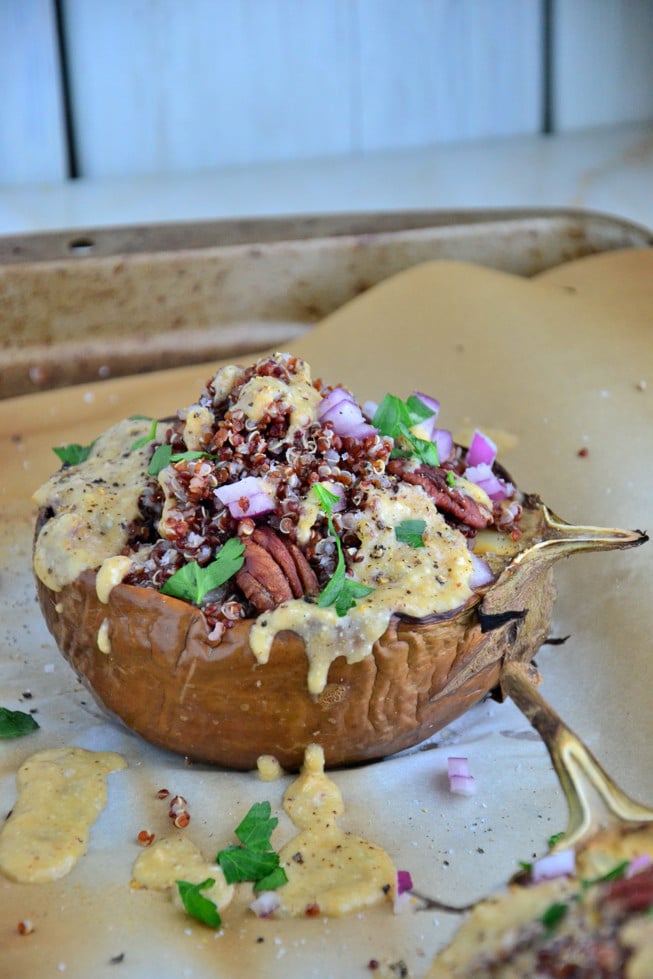 Vegetarian Stuffed Eggplant is a delicious appetizer stuffed with quinoa, pecans and more.