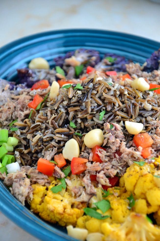 Easy Roasted Cauliflower and Wild Rice Platter Recipe in Blue Salad Bowl with Macadamia Nuts